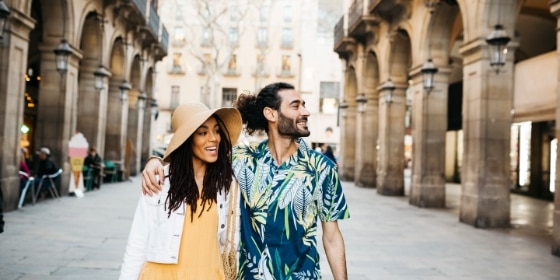 Young couple walking around Barcelona