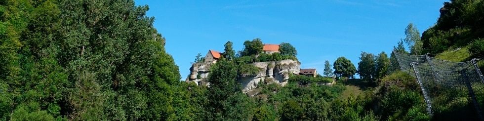 Radfahrer vor Burg in Kulmbach